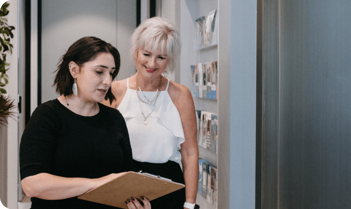 Dr Issma Katib Speaking with staff at Baylife Medical Neutral Bay and One GP Model